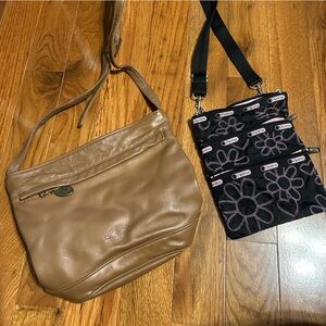 2 purses. 1 leather brown stone Mountain. 1 LeSportsac black w/ embroidery.